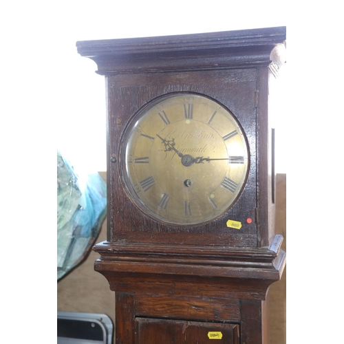 563 - An 18th century oak and pine long case clock with thirty-hour movement and brass circular dial by Ro... 