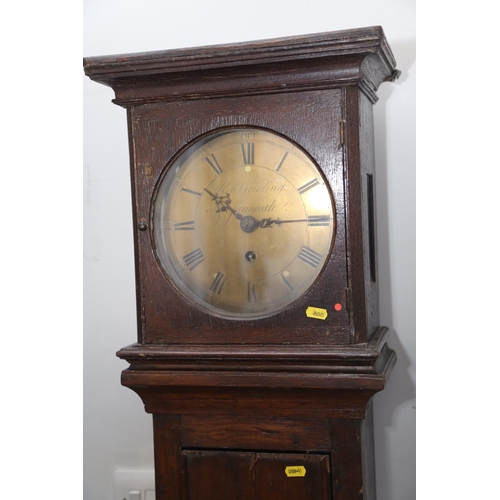 563 - An 18th century oak and pine long case clock with thirty-hour movement and brass circular dial by Ro... 