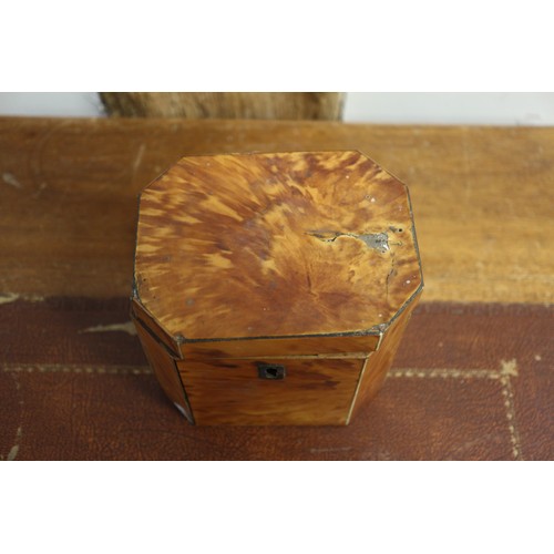 157 - A tortoiseshell octagonal single-section tea caddy, 4 1/2