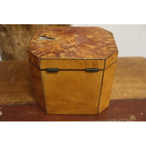 157 - A tortoiseshell octagonal single-section tea caddy, 4 1/2