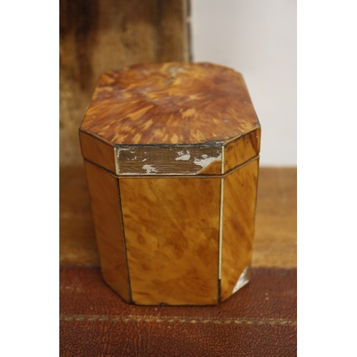 157 - A tortoiseshell octagonal single-section tea caddy, 4 1/2