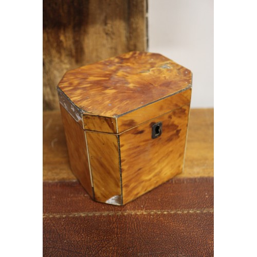 157 - A tortoiseshell octagonal single-section tea caddy, 4 1/2