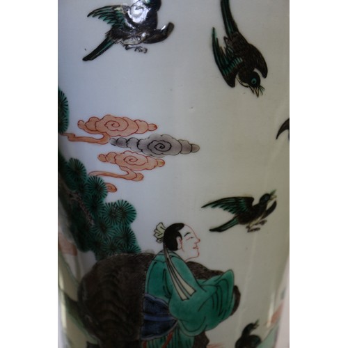 91 - A Chinese famille verte tapered cylindrical waisted flared rim vase with figures, animals and birds ... 