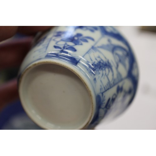 96 - A Chinese porcelain blue and white tea bowl, decorated mythical beasts and clouds with four-characte... 