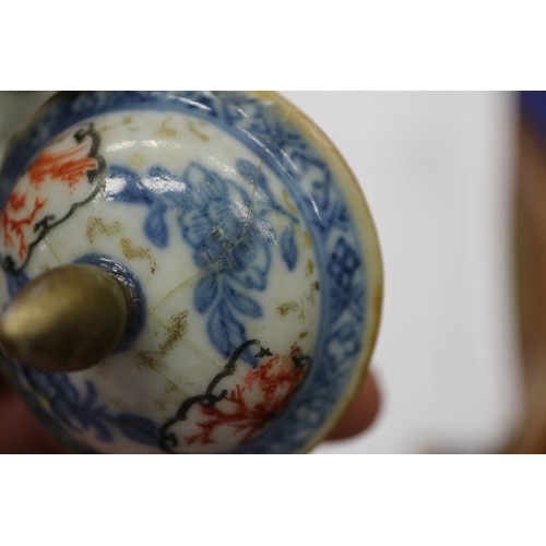 96 - A Chinese porcelain blue and white tea bowl, decorated mythical beasts and clouds with four-characte... 