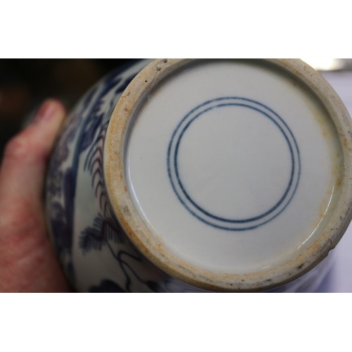 101 - A Chinese blue and white ginger jar, decorated panels with vases, tables and flowers, 5 1/2