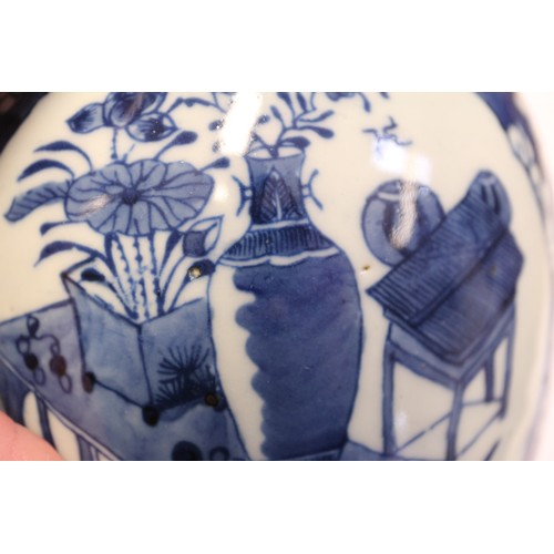 101 - A Chinese blue and white ginger jar, decorated panels with vases, tables and flowers, 5 1/2