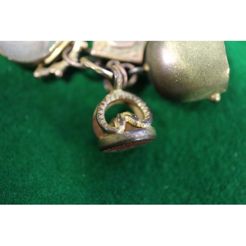 351 - A yellow metal and rock crystal heart-shaped locket set amethyst, a gilt metal locket with cameo yel... 