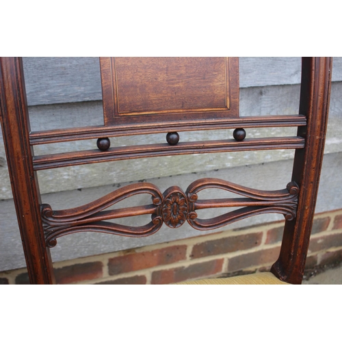 543 - A set of three 19th century carved mahogany bar back dining chairs with stuffed over seats, on turne... 