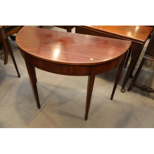 560 - A 19th century mahogany box and ebony strung semicircular side table, on square taper supports, 42