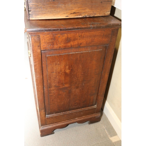 566 - A George III oak dresser, fitted shelves over three drawers and two cupboards enclosed arched panel ... 