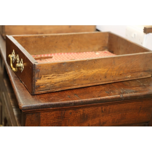 566 - A George III oak dresser, fitted shelves over three drawers and two cupboards enclosed arched panel ... 