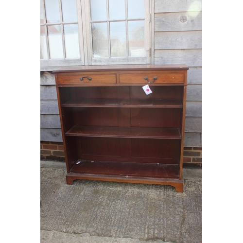 601 - A Maples late 19th century walnut bookcase, fitted two drawers over open shelves, on bracket feet, 4... 