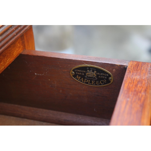 601 - A Maples late 19th century walnut bookcase, fitted two drawers over open shelves, on bracket feet, 4... 