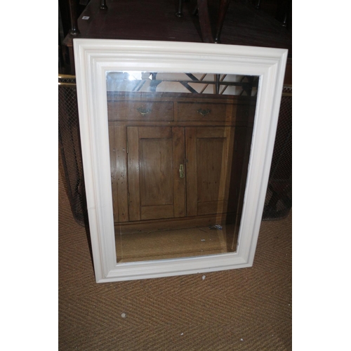 622 - A cream painted frame mirror with bevelled plate, 18