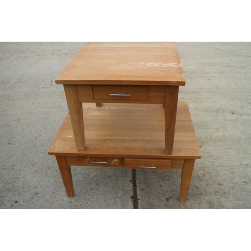 652 - A light oak coffee table, fitted four drawers, on square taper supports, 36