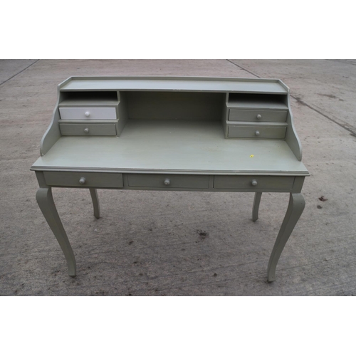 653 - A painted shape top dressing table, fitted four drawers and recess over three drawers, on cabriole s... 