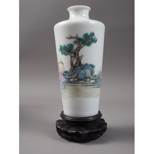 123 - A Chinese porcelain tapered vase, decorated immortal and child carrying a gourd, seal mark to base w... 