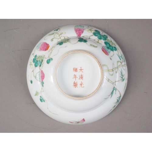 138 - A Chinese famille verte bowl, decorated strawberries, insects and foliage, six-character mark to bas... 