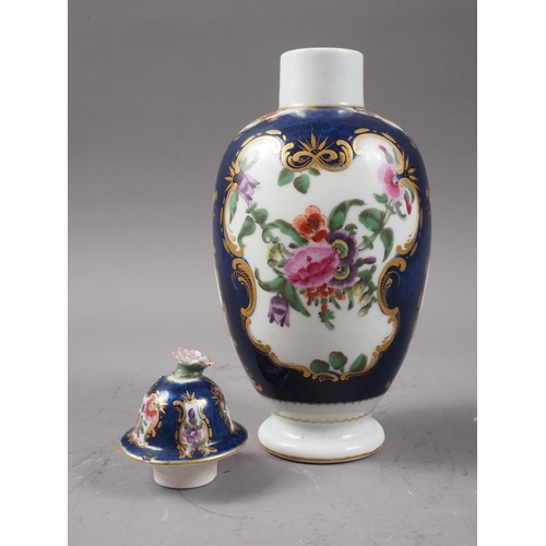 14 - An 18th century Worcester oviform tea caddy with reserved floral panels on a blue scale ground with ... 