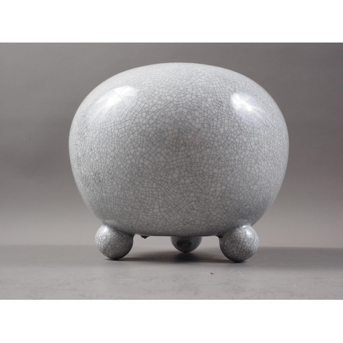 148 - A Chinese bulbous crackle glazed vase, on three bun feet, 6 1/4