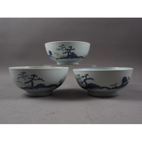 150 - Three Nanking cargo bowls with blue and white landscape decoration, 6 1/2