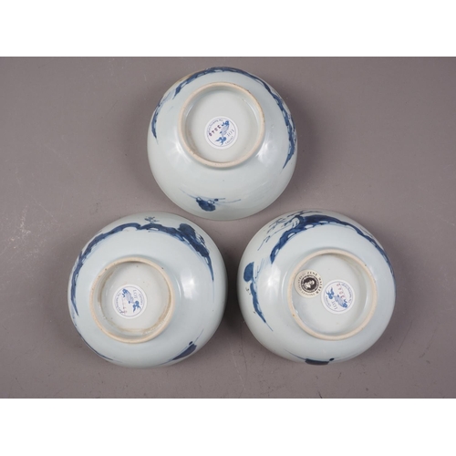 150 - Three Nanking cargo bowls with blue and white landscape decoration, 6 1/2