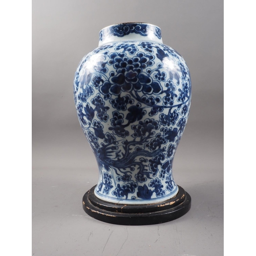 154 - A Chinese porcelain blue and white phoenix decorated jar, 13 1/2