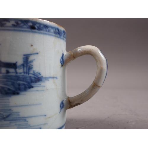 156 - A Chinese blue and white mug with building in landscape decoration (restored and cracked), a blue an... 