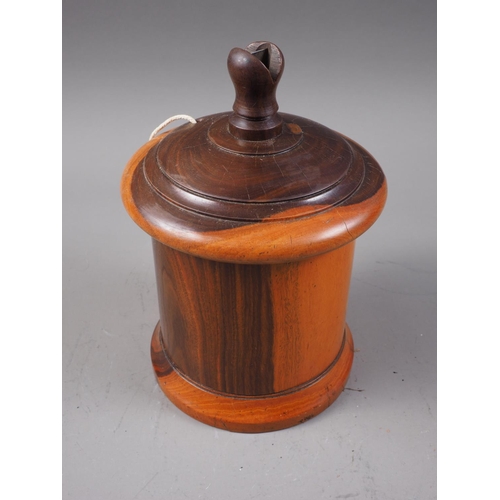 209 - A turned lignum vitae  string box, 8 1/2