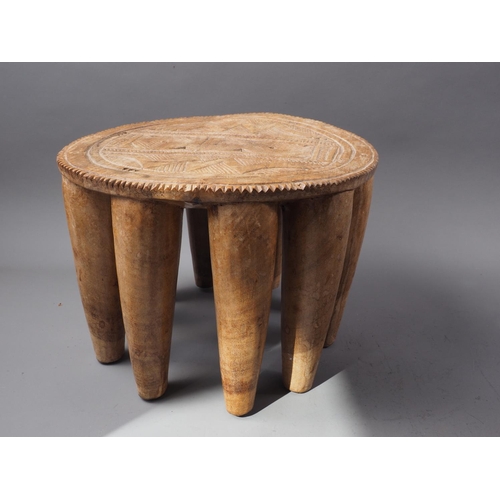 212 - Three mid 20th century Nigerian hardwood (iroko) Nupe stools, collected in 1950s in Abuja, largest 1... 