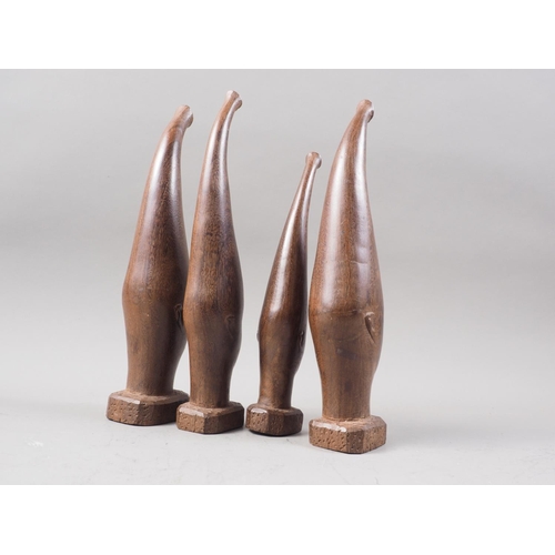 213 - A set of four mid 20th century carved wenge 