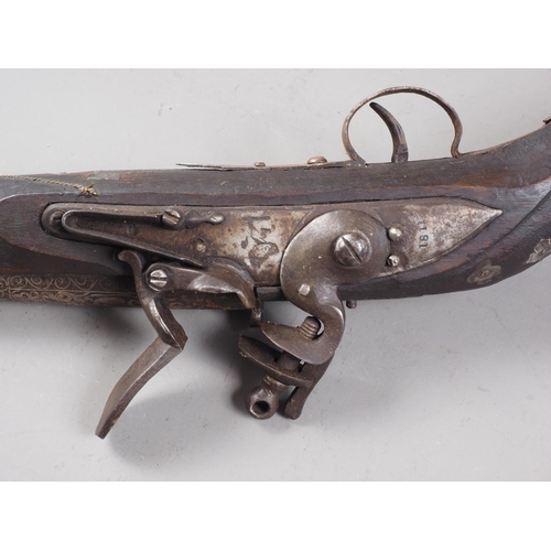 254 - A Jezail flintlock musket with scroll etched barrel, 44 3/4