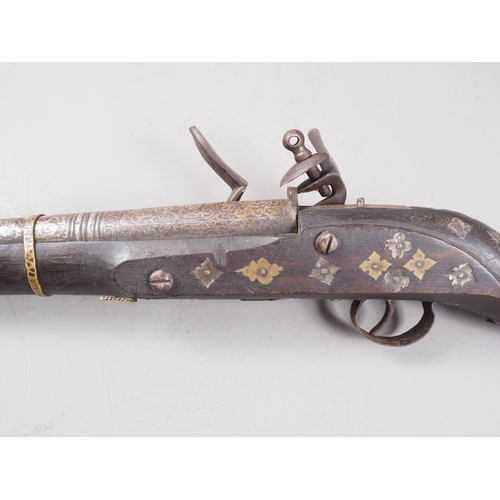 254 - A Jezail flintlock musket with scroll etched barrel, 44 3/4