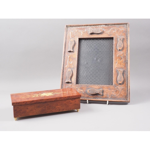 270 - An Italian marquetry music box and a carved wood and painted frame with fish decoration