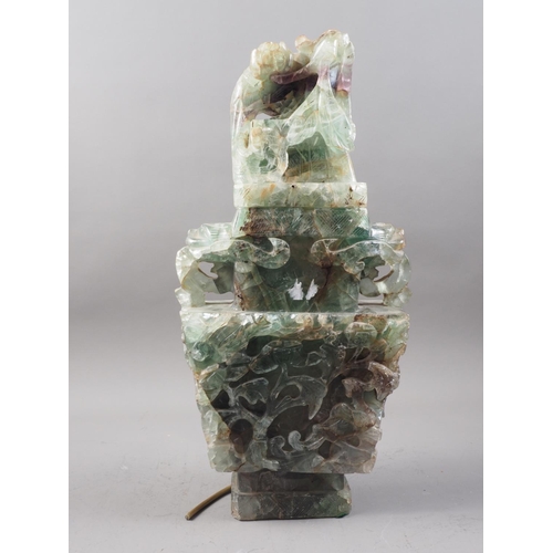 326 - A Chinese carved fluorite two-handled vase with phoenix cover, 20