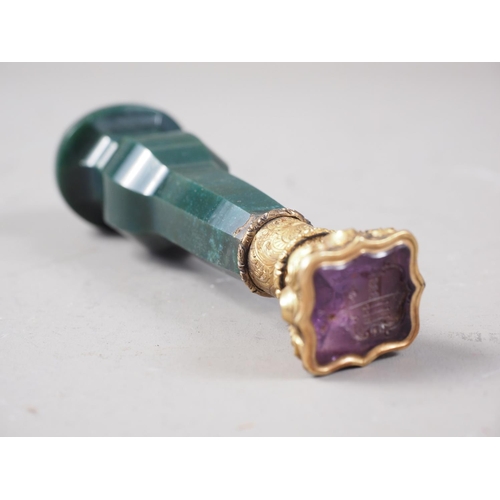 357 - A 19th century bloodstone and gilt metal desk seal with amethyst matrix, 3 1/4