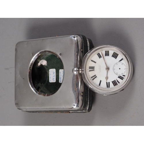 369 - A silver cased open faced pocket watch by J C Heald, in silver fronted travel case