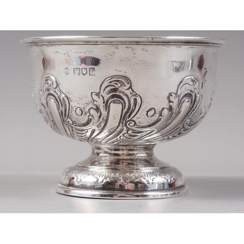 373 - A silver pedestal bowl with embossed decoration, 4.2oz troy approx