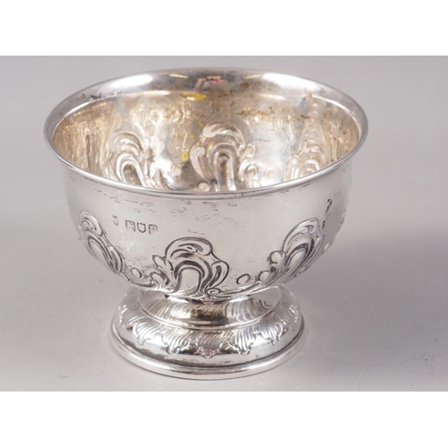 373 - A silver pedestal bowl with embossed decoration, 4.2oz troy approx