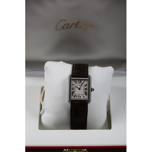 380 - A gentleman's Cartier stainless steel cased Tank wristwatch with quartz movement, silvered dial and ... 