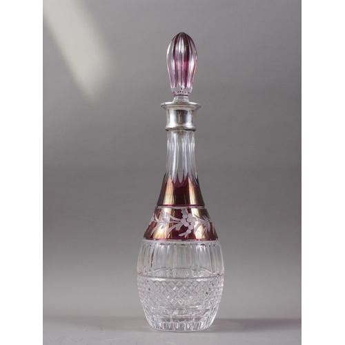 384 - A clear and overlaid cranberry cut glass silver collared decanter, 15