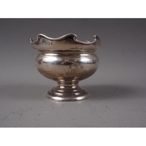 388 - A silver pedestal bowl with shaped rim, 4.1oz troy approx