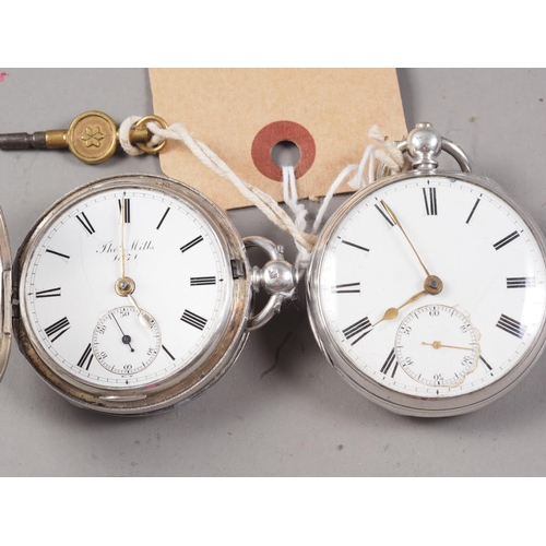 412 - A silver cased full hunter pocket watch with white enamel dial by Thomas Mills (dial cracked), and a... 