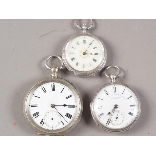 413 - A silver cased open faced fob watch by Thomas Wheeler, a silver cased fob watch with engraved decora... 