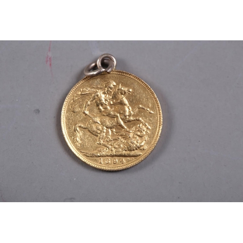 424 - A gold sovereign, dated 1894 (hard mounted)