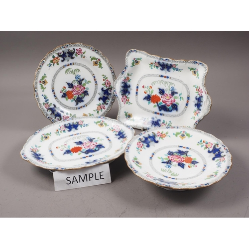 70 - A Minton part dessert service with floral and scrolled decoration