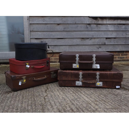 751 - A practically unused leather vintage suitcase and a number of other suitcases, various