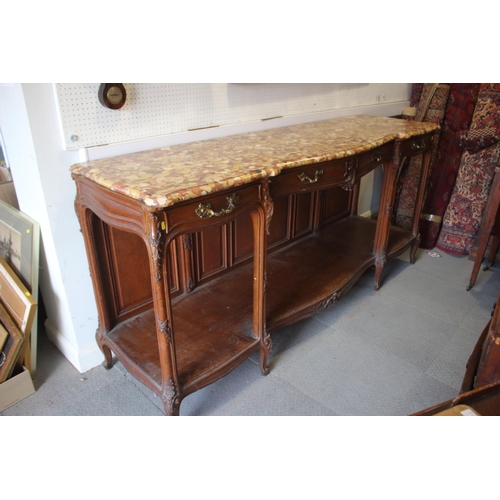 608 - A 19th century French carved oak buffet with serpentine marble top over three drawers and undertier,... 