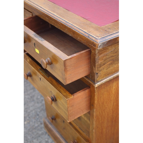 642 - A partners early 20th century mahogany double pedestal desk with red leatherette top, fitted two dra... 